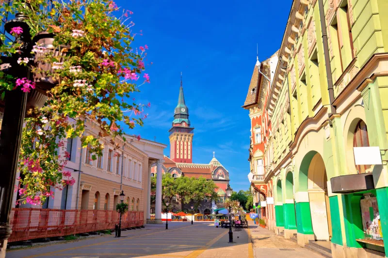 subotica city hall and main square colorful street view, vojvodina region of serbia