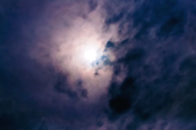 beautiful, unusual sky blue cloudsthe sun is behind the clouds