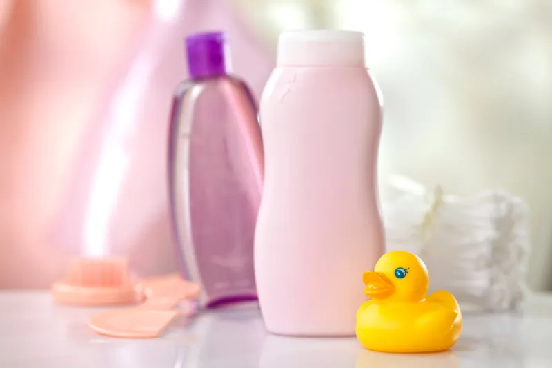 baby bath accessories on white table, selective focus