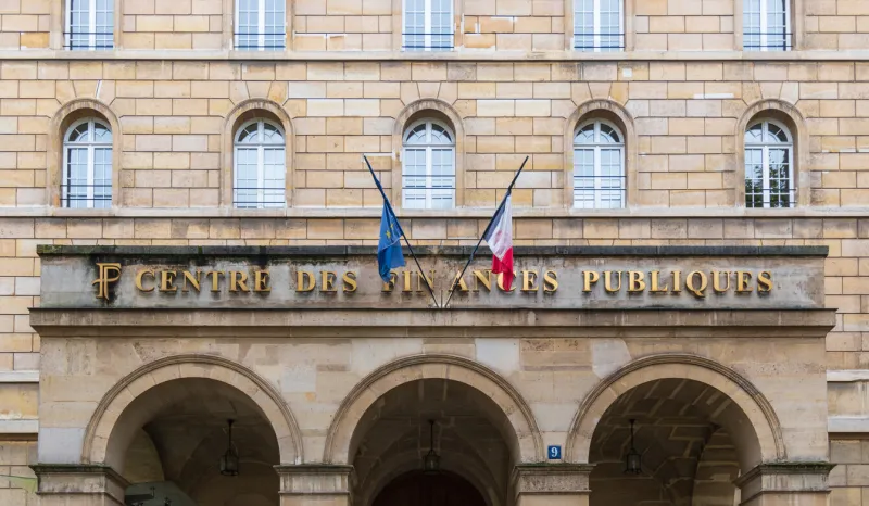 paris, france - 10 27 2024   the facade of a public finance center, contact for individuals for taxes