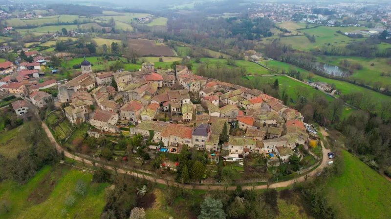 aerial view of the old town of pérouges in france on a cloudy spring day