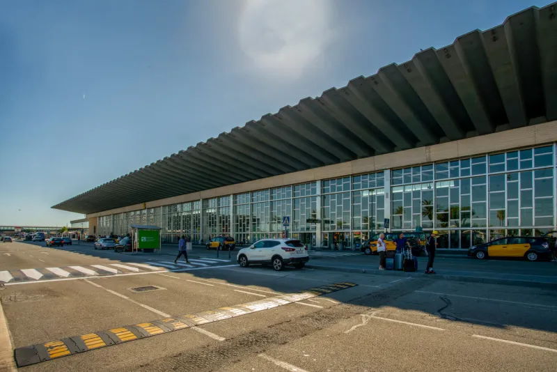 08-28-2022 barcelona  spain airport josep tarradellas barcelona-el prat people and taxi cars - amazing sunny summer day