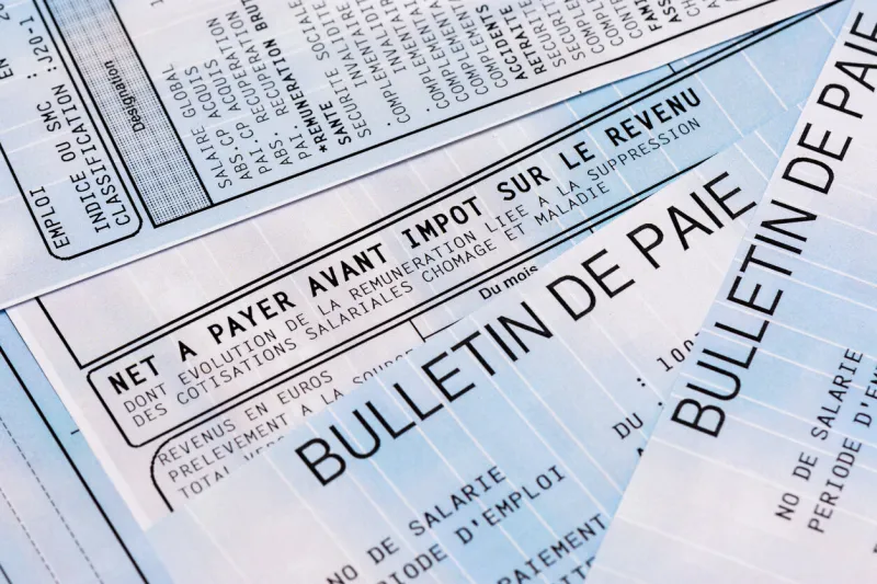 close up on a french payroll with social contributions and income tax deduction, mandatory in france since january