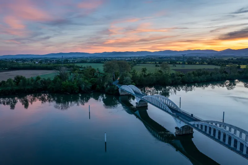 aerial view at sunset by river rhone, thoissey, ain, eastern france