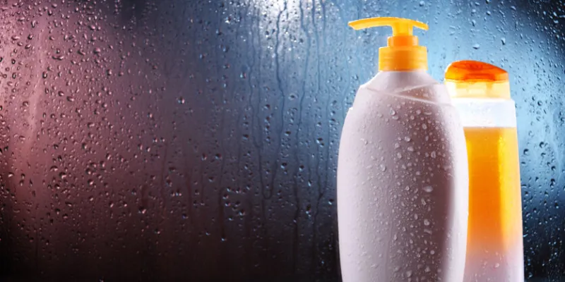 different containers of body care products in the bathroom