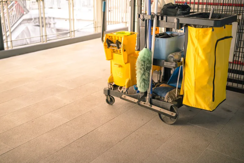 cleaning tools cart in public walk way bucket and set of cleaning equipment concept of service, worker and equipment for cleaner and health