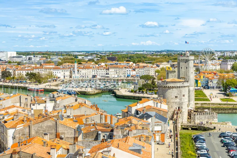 chain tower and saint nicolas tower in la rochelle on a sunny day in france