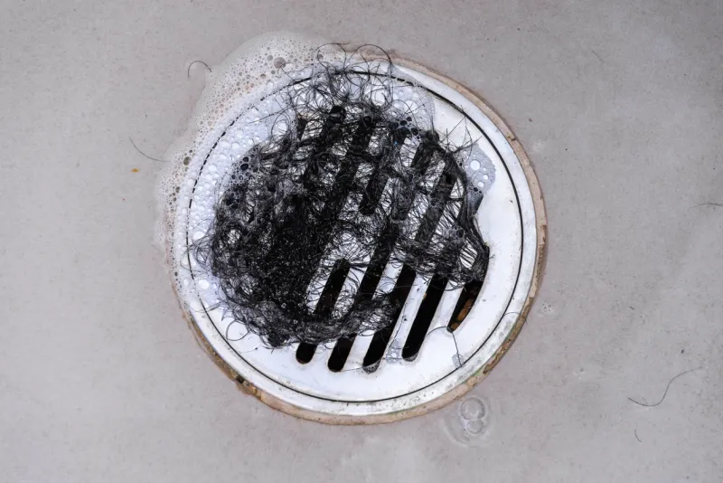 Cheveux dans la douche