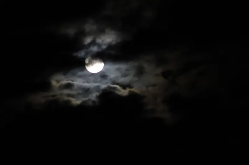 bright moon, dark clouds