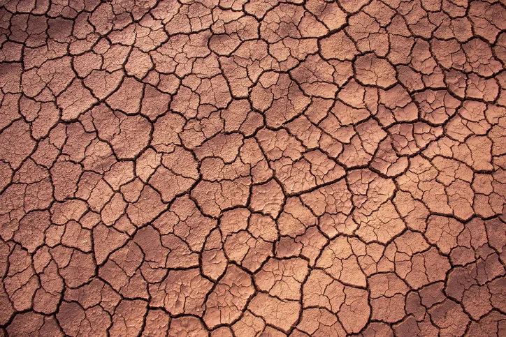 texture with dry and cracked soil on a farm in the city of dourados, mata grosso do sul, brazil