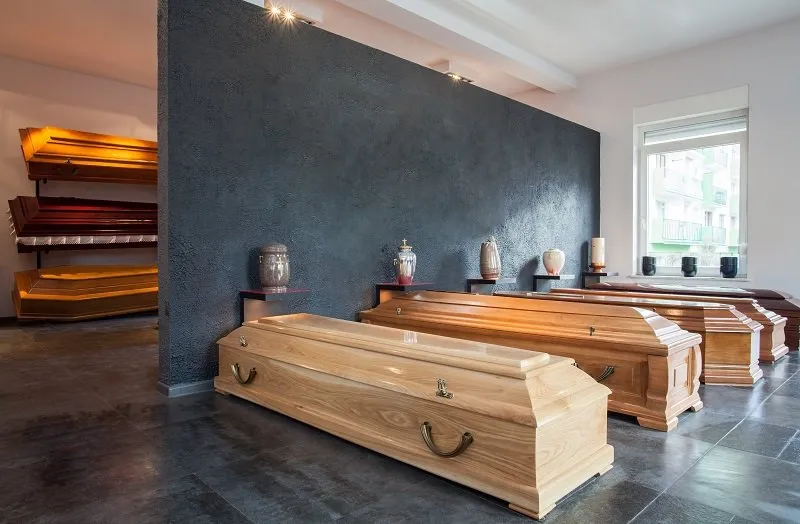 coffins standing in funeral house
