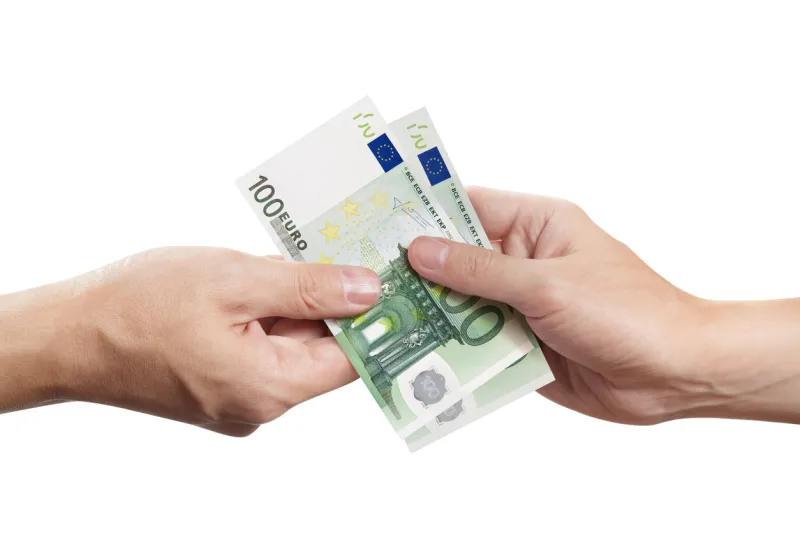 hands sharing euros, isolated on white background