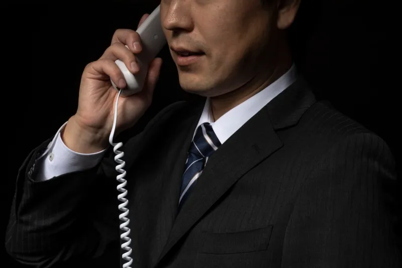 men talking on the phone