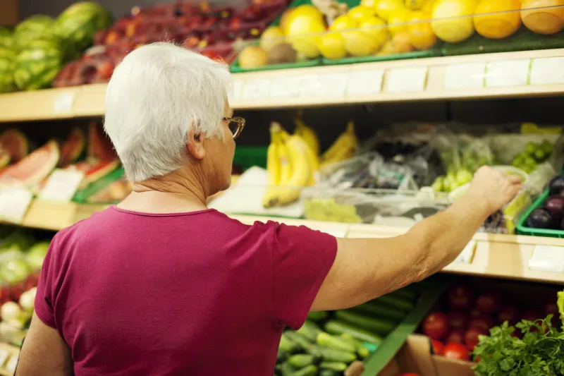 senior woman at supermarket
