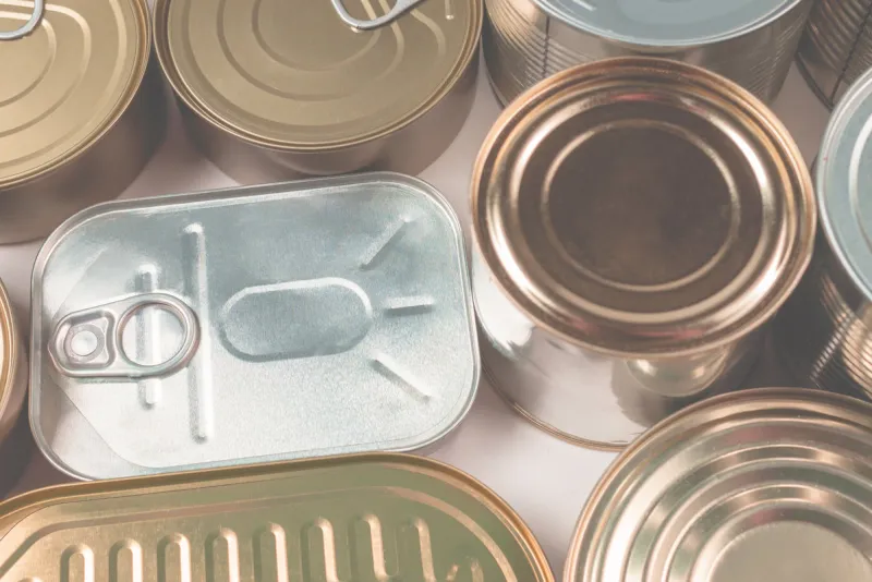 mix of cans isolated on white background copy space