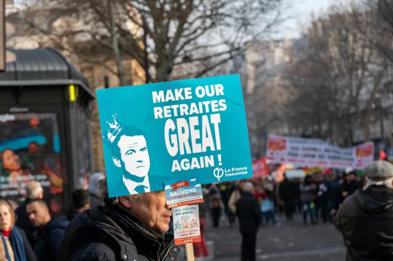 paris, france - january 24 2020   protest against the retirement pension reform of president macron - protestor with a make our retirement great again sign