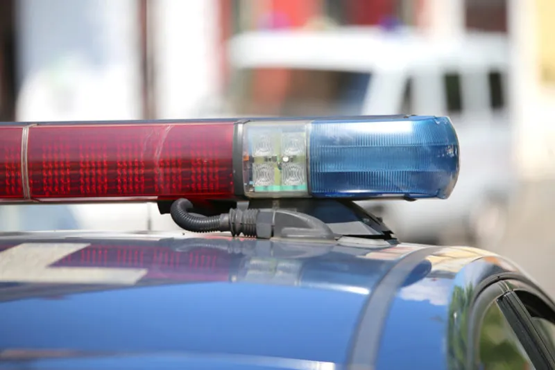 detail of the lights of red and blue police sirens during city control