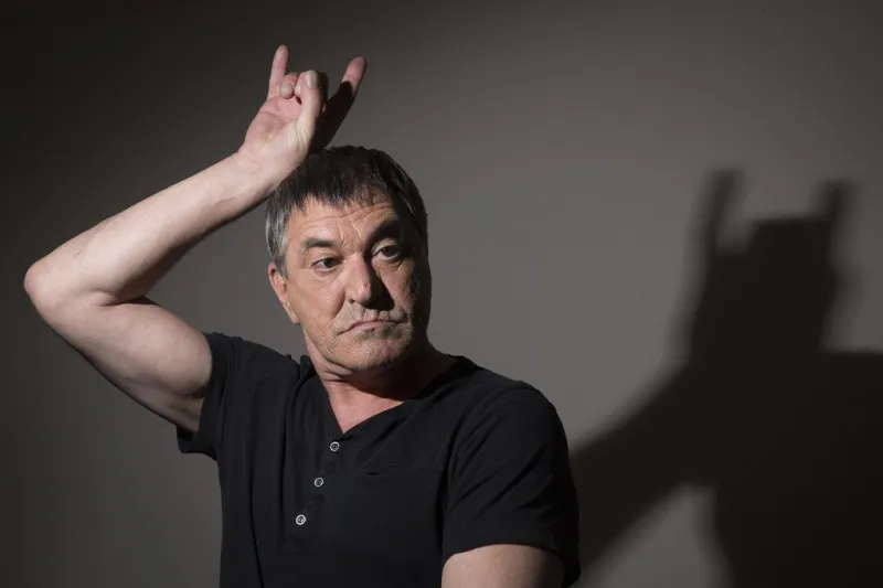 french humorist jean-marie bigard poses at his home, on may 6, 2014 in paris  afp photo  joel saget (photo by joël saget   afp)