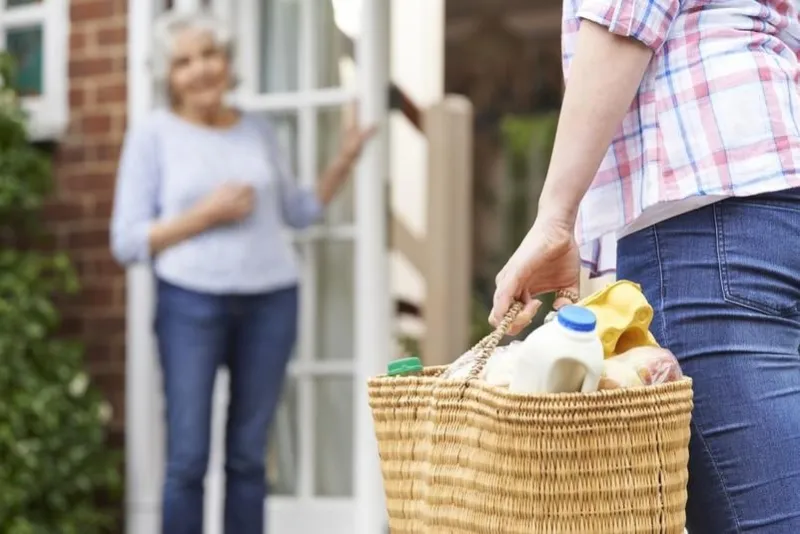 person doing shopping for elderly neighbour