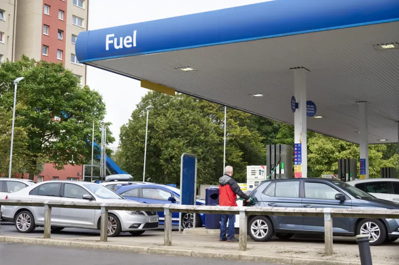 london, england, uk, september 26th 2021, customer filling car with petrol due to the news media stating the country was facing a fuel shortage uk