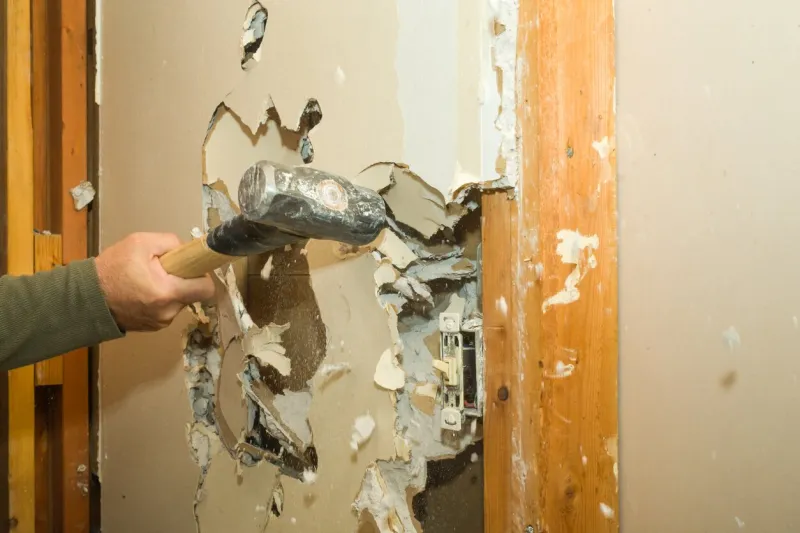 a sledge hammer is a great tool for removing unwanted drywall