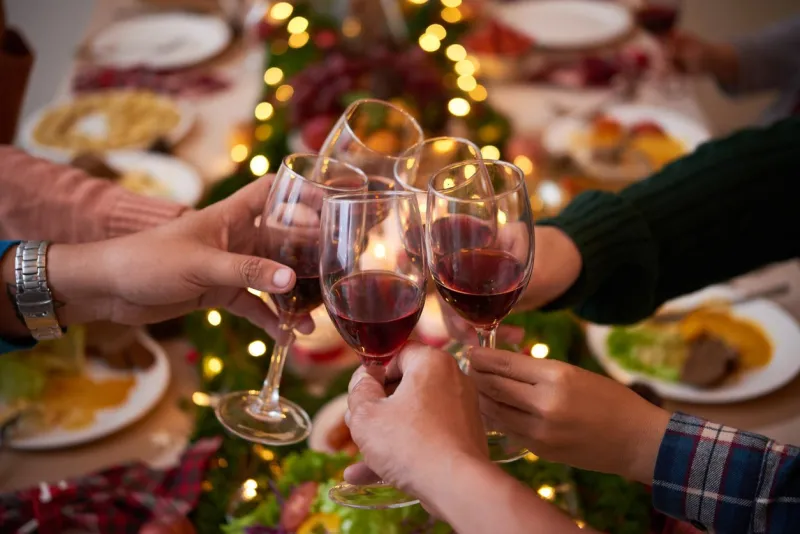 group of people toasting for christmas