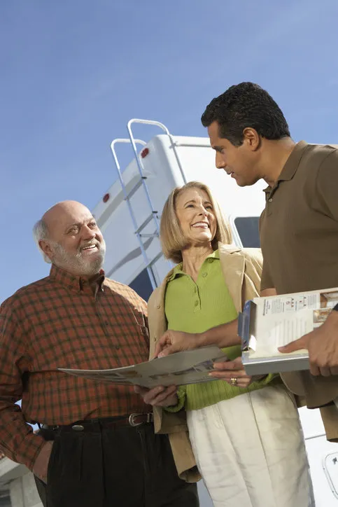 salesperson talking to customers