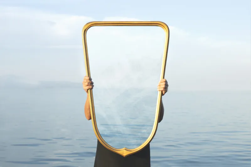 surreal image of a transparent mirror, concept of door to freedom