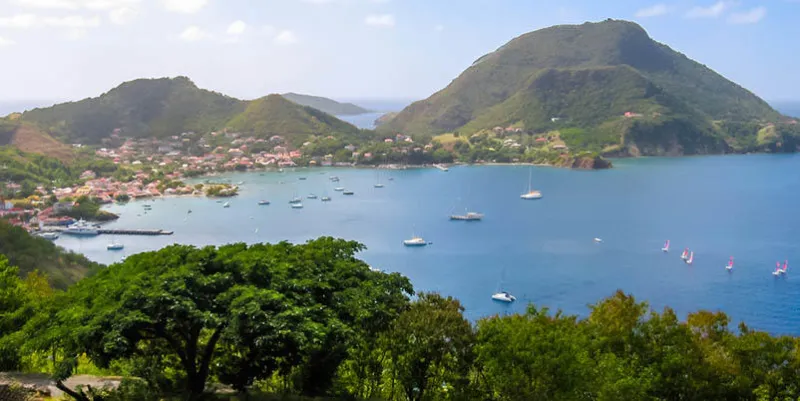 spectacular overlook of bay of anse du bourg in terre-de-haut, considered the third bay in the world for beauty archipelago of les saintes, 15 kilometers from guadeloupe, antilles, caribbean