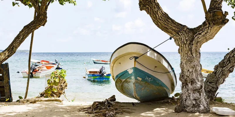 colored small boats on antilles sea, with blue sea