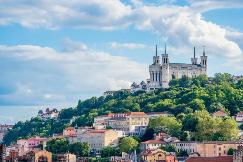 view on top of a hill of the basilica de fourviere, one of the most famous landmarks in lyon, france