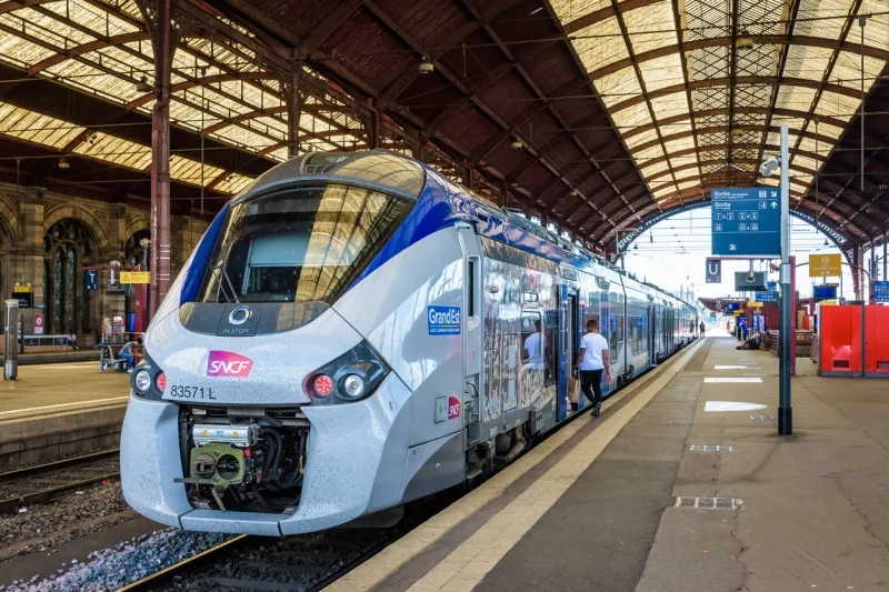 strasbourg, france - september 16, 2019  a regiolis ter regional train from french company sncf is stationing at the platform in the sncf train station waiting for passengers to get on