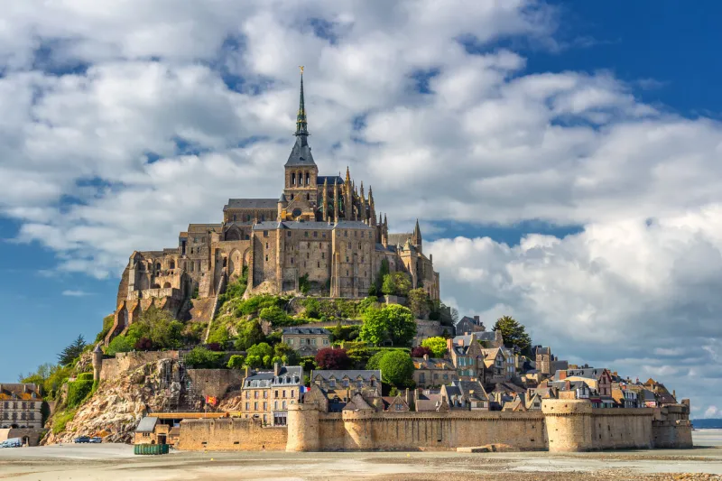 saint michael's mount is an island commune in normandy the island has held strategic fortifications since ancient times and has been the seat of a monastery