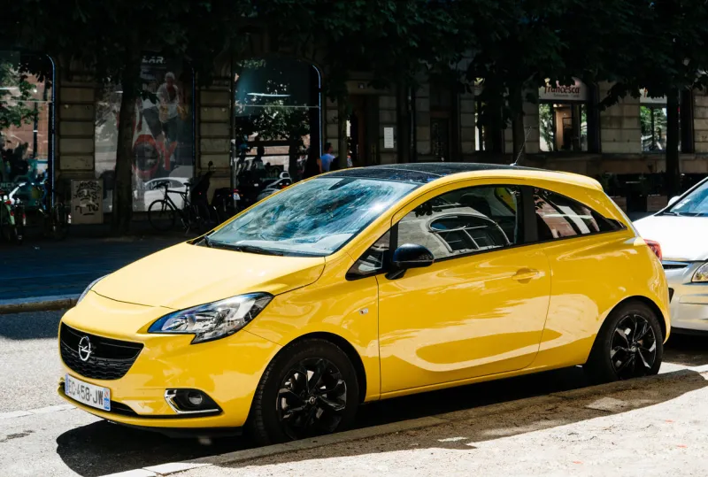 strasbourg  new yellow opel corsa parked on the street in france