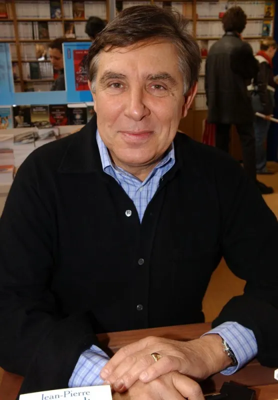 french tv presenter jean-pierre foucault promotes his book 'le sourire aux larmes' during the paris book fair 'le salon du livre' held at porte de versailles, in paris, france, on march 18, 2006 photo by bruno klein abacapresscom , 94028 46 paris france