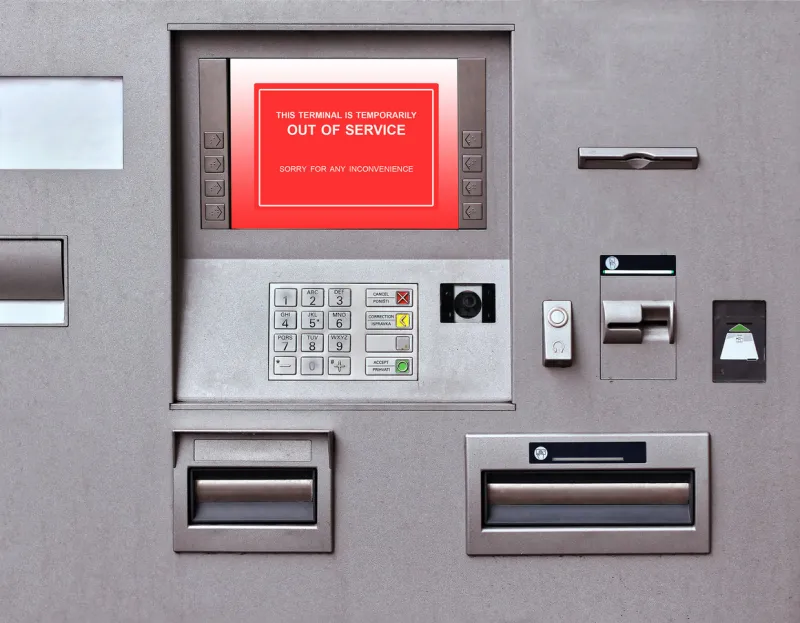 banking machine with out of service sign on screen