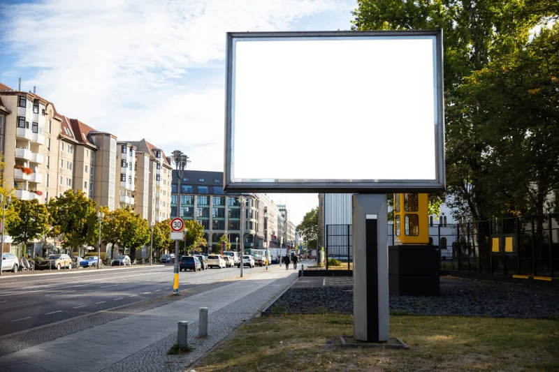 blank billboard mockup for advertising, city street background