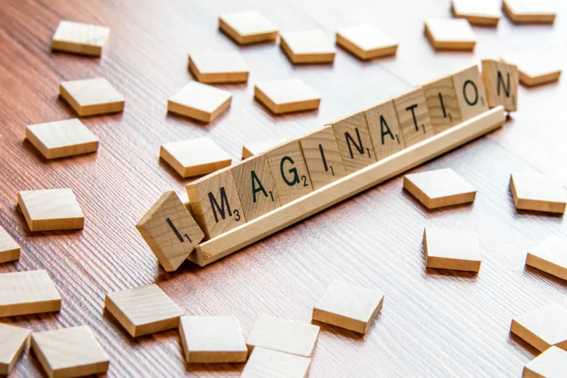 houston, tx, usa - april 4, 2015  scrabble word game wood tiles spelling imagination