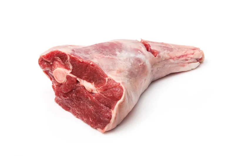 leg of lamb isolated on a white studio backgroundleg of lamb uncooked isolated on a white studio background