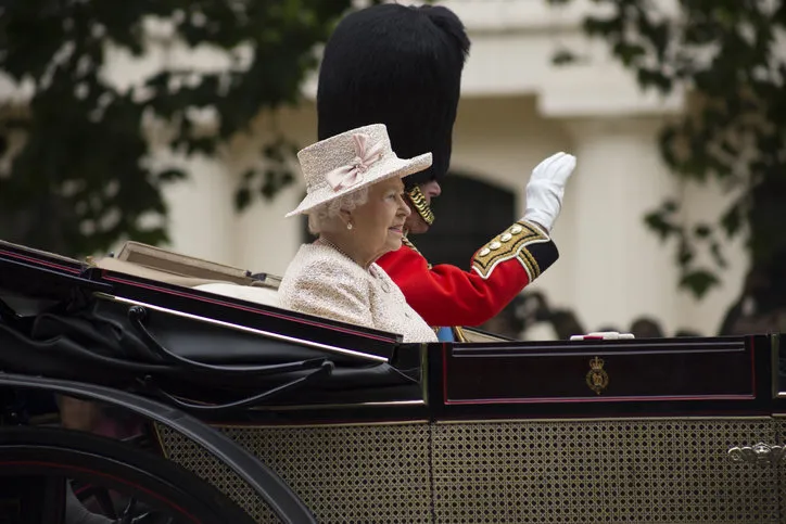 london, england - june 13, 2015  queen elizabeth ii in an open carriage with prince philip for trooping the colour 2015 to mark the queens official birthday, london, uk
