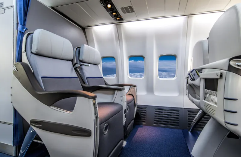 empty business class airplane cabin with no passengers inside