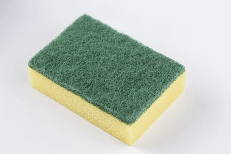 artificial fibre sponge on a white background scouring pads