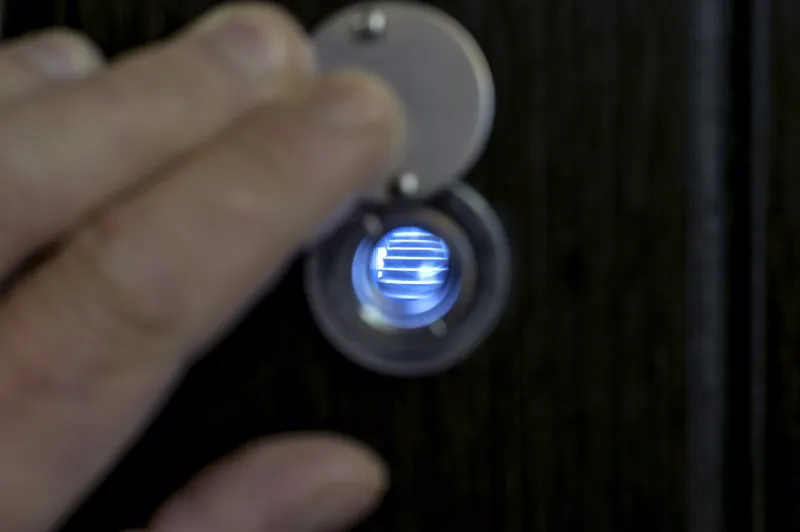 view through the peephole on the landing sharpness on the stair step