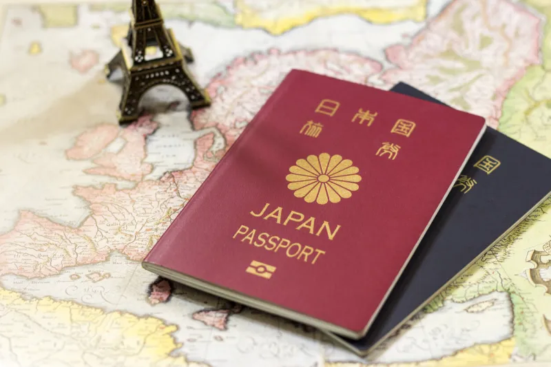 japanese passports on the antique europe map, retro map