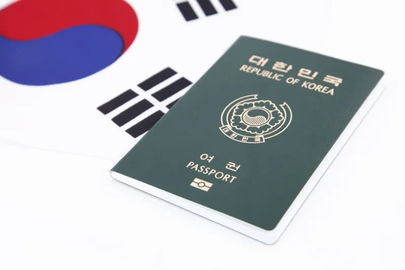 south korean passport with flag
