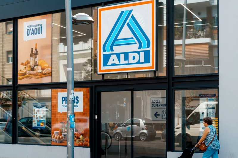 barcelona, spain-august 16, 2022 logo and facade of aldi, german discount supermarket chain the first store was opened in essen by brothers karl and theo albrecht in