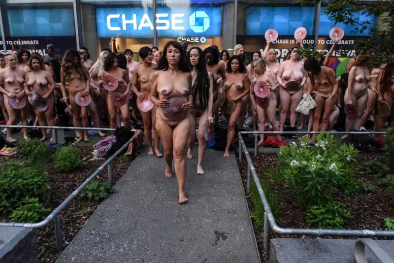photographer spencer tunick stages one of his large scale group nude shoots in new york city