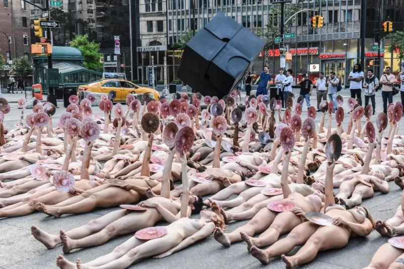 photographer spencer tunick stages one of his large scale group nude shoots in new york city
