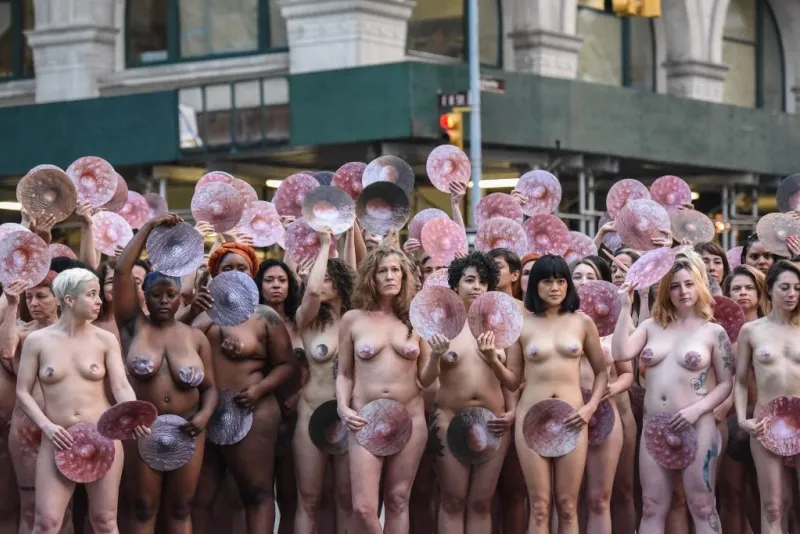 photographer spencer tunick stages one of his large scale group nude shoots in new york city