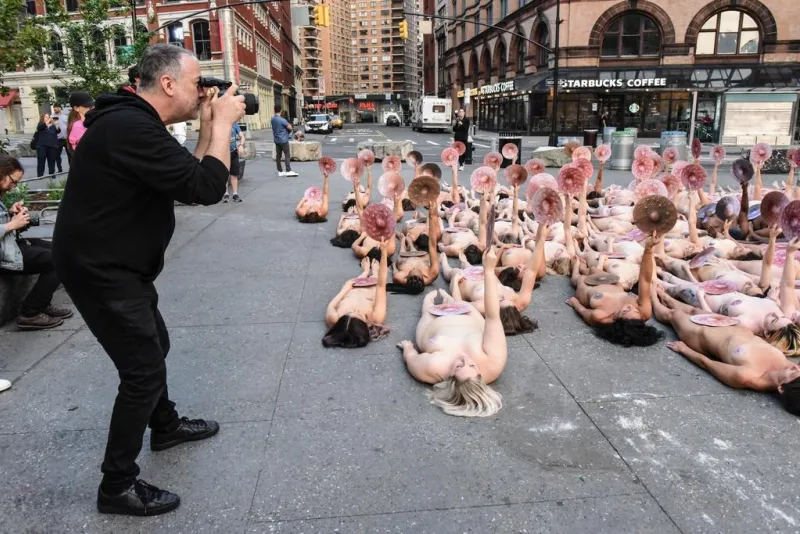 photographer spencer tunick stages one of his large scale group nude shoots in new york city